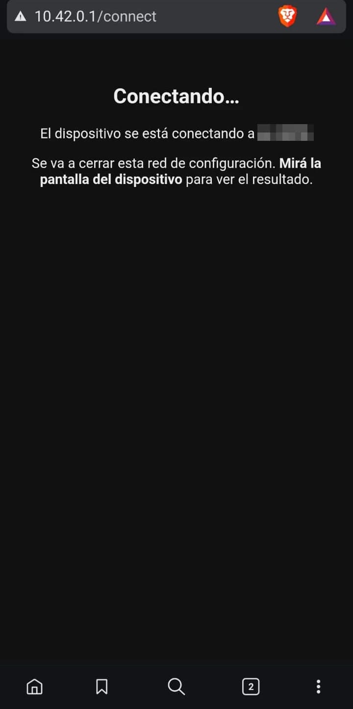 Página del celular que avisa que el dispositivo se está conectando a la red elegida y que hay que mirar la pantalla